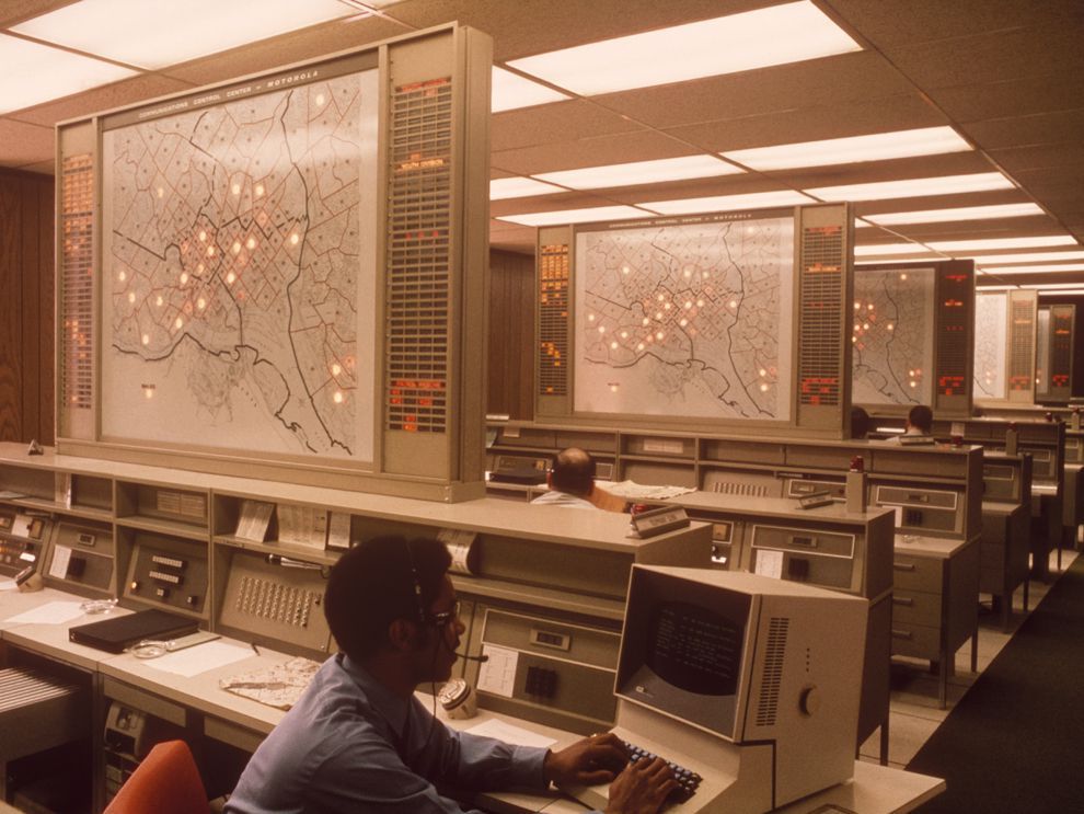 Communications control center with illuminated map boards